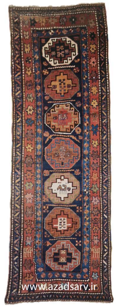 Figure 19 . Kurdish village rug from western Iran. These pleces are all wool and appear in a variety of sizes with traditional Persian designs. Ofien they cannot be specific- ally localised, but they are identified by their texture and often by their excellent wool. azadsarv carprt فرش دستبافت آزادسرو