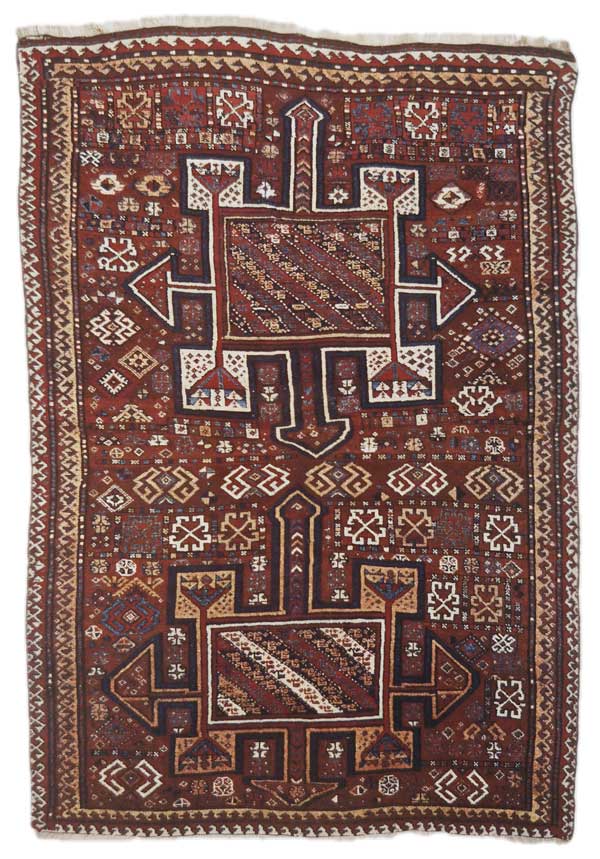 Figwre 20. Quchan Kurd rug from Khurasan. These rugs with geometric figures are often unusualy thick. Although the Quchan Kurds in the east and the Kurds in western lran have been separated for several hundred years, there are still many common design elements in the two types ofrug. This suggests that the Kurds were weaving rugs well before onе part ofthe population was setiledon Persia's eastern borderazadsarv carprt فرش دستبافت آزادسرو 