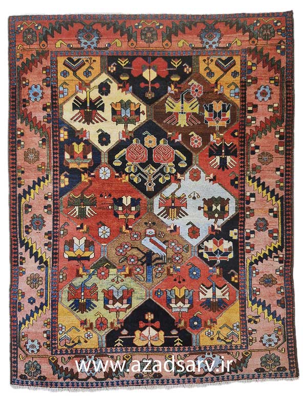 Figure 25. Bakhtiari rug in the most common design in which the field is divided into square compartments filled with stylised floral figures This rendition of the design may date from the last part of the nineteenth century, as more recent versions show a repetition CO the same motifs with a darker colour schemeazadsarv carpet فرش دستباف آزادسرو