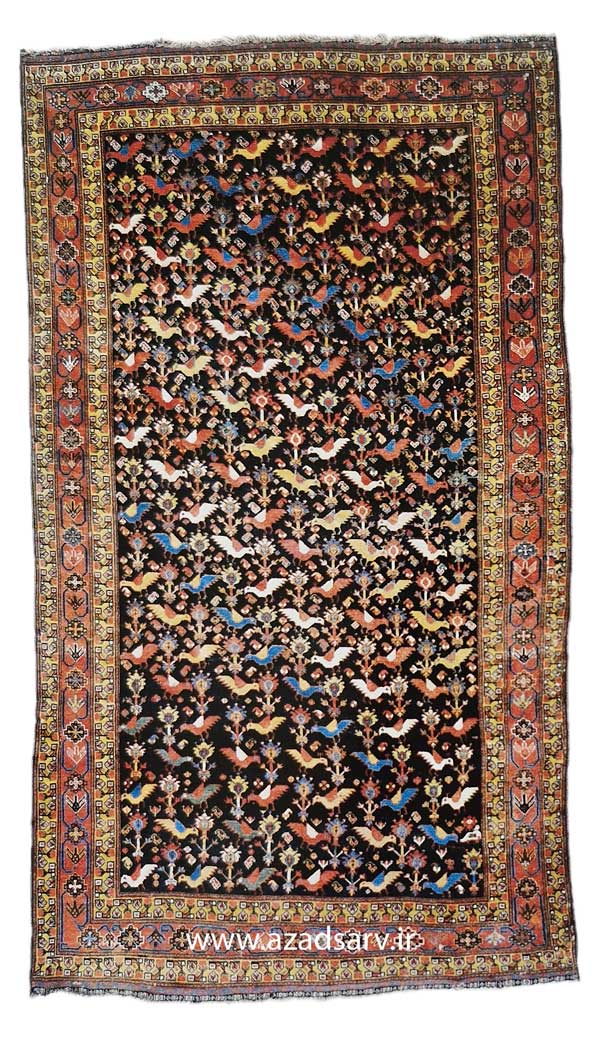 Figure 31. Khamseh rug with an allover pattern of birds. This is a common design on Khamseh rugs and may be a product of the Arab subtribe. Such rugs are less likely to be double- warped than Qashga'i rugs and consequently have a looser feel to them azadsarv carpet فرش دستباف آزادسرو 