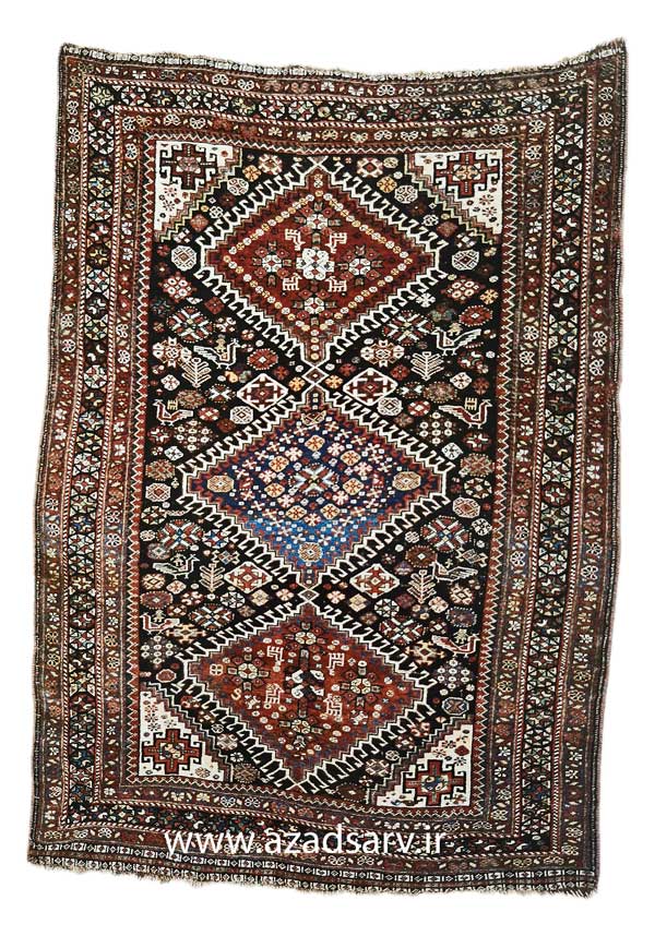 Figure 33. Lori rug with a dark tonality common to thus group. These are usually less finely woven than Qashqa i rugs, and the Lori use a variety of designs common to the Shiraz area.azadsarv carpet فرش دستباف آزادسرو