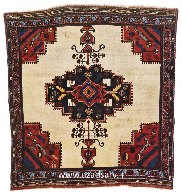 Figure 35. Afshar rug in a medallion design. Note the stylised vases and flowers, which suggest that the design is an adaptation from a city rug in which the vase and flowers would be realistically drawn.azadsarv carpet فرش دستباف آزادسرو