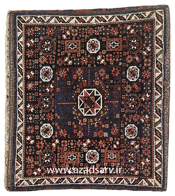 Figure 37. Baluchi rugs often appear only in dark tones, but this bag face has strong highlights in ivory. The figures in the field often include birds or other repeating devices, and occasionally the finest of these pieces will show patches of silk pile.azadsarv carpet فرش دستباف آزادسرو