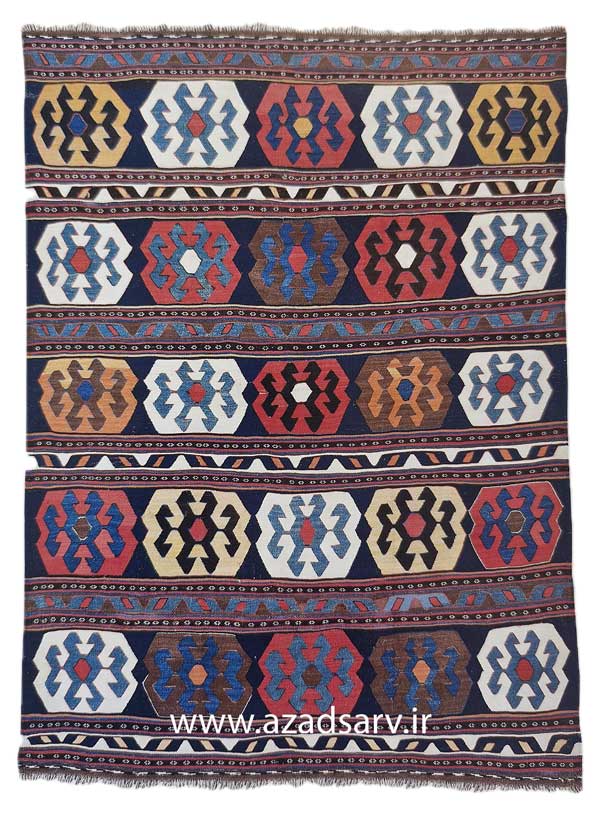 Figure 40. Kilim possibly woven by the Shahsevan of north-western Iran. As one would expect, the designs are rigidly geometric, and the colours boldly contrasting. While the exact local origin of such a piece cannot be determined, it seems to belong within the cultural sphere of Azerbaijan, although one cannot be certain on which side of the national borders it was woven. Approx. 94 x 69ins. (239 x 176cm)azadsarv carpet فرش دستباف آزادسرو